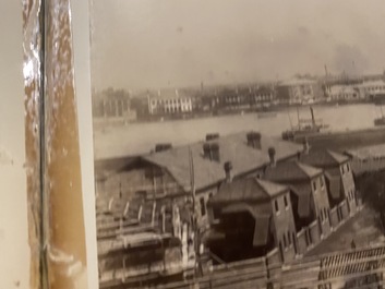 A Chinese album with nine silver gelatin albumen photos of a.o. the Shanghai Bund, dated 1899