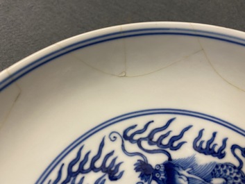 A Chinese blue and white 'dragon' plate, Qianlong mark and of the period