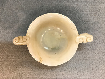 A Chinese pale celadon jade libation cup, 18/19th C.