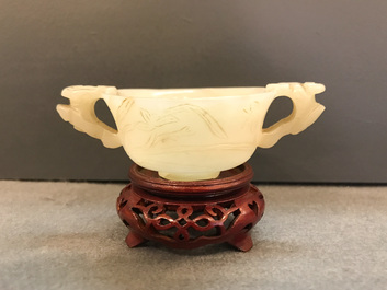 A Chinese pale celadon jade libation cup, 18/19th C.