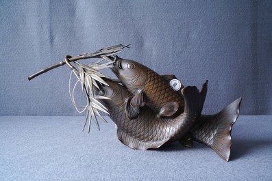 A Japanese bronze group depicting two koi fish, Meiji, 19th C.