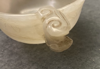 A Chinese pale celadon jade libation cup, 18/19th C.