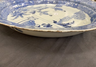 A large Chinese blue and white 'Romance of the Western chamber' dish, Qianlong