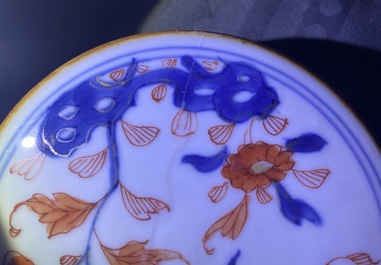 A pair of Chinese Imari-style 'qilin and phoenix' jars and covers, Kangxi