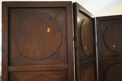 A Chinese wooden room divider with blue and white 'dragon' plaques, 19th C.