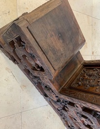 A Chinese finely carved wooden display stand, 19th C.