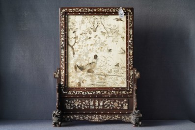 A Chinese mother-of-pearl-inlaid wooden screen with silk embroidery, 19th C.