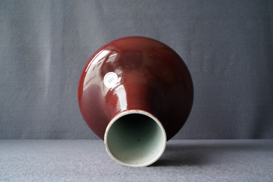 A Chinese monochrome red bottle vase, Kangxi