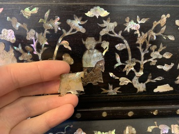 A large Chinese mother-of-pearl-inlaid wooden screen with silk embroidery, 19th C.