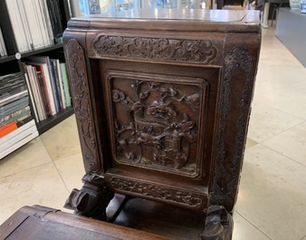 A Chinese finely carved wooden display stand, 19th C.