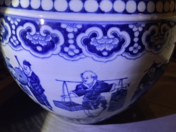 A pair of Chinese famille rose jardini&egrave;res and a blue and white example, 19th C.