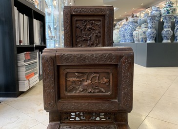 A Chinese finely carved wooden display stand, 19th C.