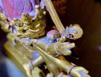 A Sino-Tibetan gilt bronze group of Mahakala and his consort Yab-Yum, 19th C.