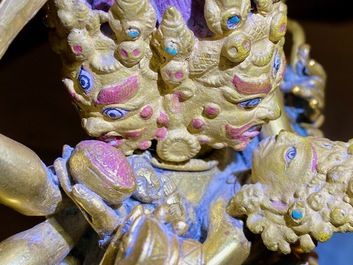 A Sino-Tibetan gilt bronze group of Mahakala and his consort Yab-Yum, 19th C.