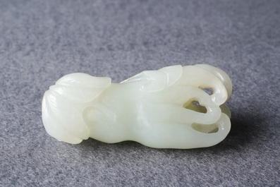 A Chinese celadon jade 'Buddha hand' carving, 19th C.