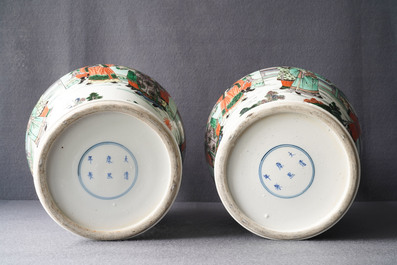 A pair of Chinese famille verte vases with figures on a terrace, Kangxi mark, 19th C.