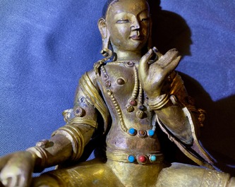 Une figure de Tara en bronze dor&eacute; incrust&eacute; de corail et turquoise, Sino-Tibet, 18&egrave;me