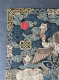 A Chinese embroidered silk rank badge with a crane for first-rank civil official, Qianlong/Jiaqing