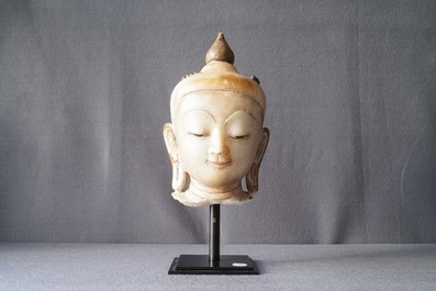 A gilt-lacquered alabaster head of Buddha, Burma, 19th C.