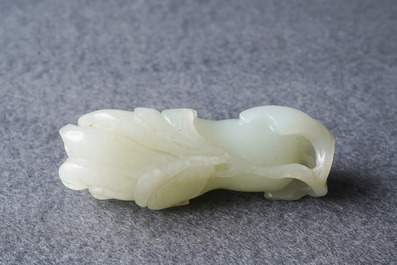 A Chinese celadon jade 'Buddha hand' carving, 19th C.