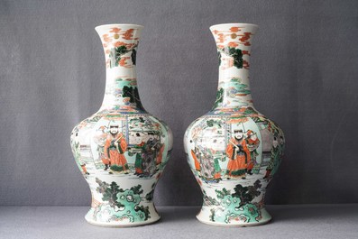 A pair of Chinese famille verte vases with figures on a terrace, Kangxi mark, 19th C.