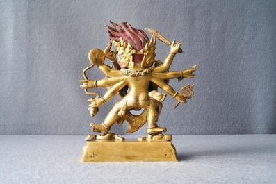 A Sino-Tibetan gilt bronze group of Mahakala and his consort Yab-Yum, 19th C.