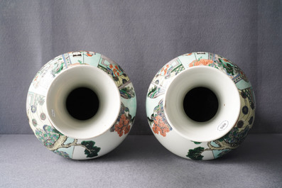 A pair of Chinese famille verte vases with figures on a terrace, Kangxi mark, 19th C.