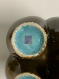 A Chinese conjoined four-part brown-glazed vase, Qianlong mark, 19/20th C.