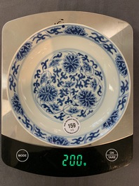 A pair of Chinese blue and white 'lotus scroll' plates, Guangxu mark and of the period