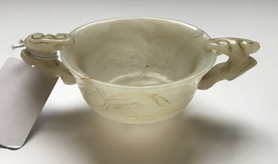 A Chinese pale celadon jade libation cup, 18/19th C.