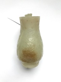 A Chinese celadon russet jade chilong-handled jug, Qing