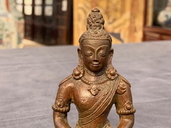 A Chinese bronze figure of Buddha Amithayus, 17/18th C.