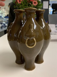 A Chinese conjoined four-part brown-glazed vase, Qianlong mark, 19/20th C.