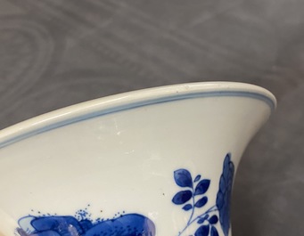A Chinese blue and white vase with precious objects and floral designs, Kangxi