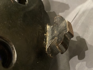 A large Chinese bronze incense burner and cover on carved wooden stand, Ming