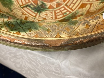 A Chinese sancai-glazed stoneware basin, late Ming