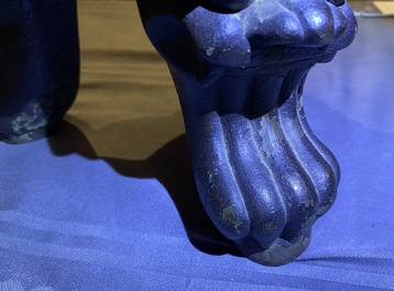 A large Chinese bronze incense burner and cover on carved wooden stand, Ming