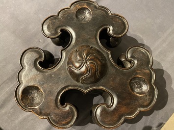 A large Chinese bronze incense burner and cover on carved wooden stand, Ming