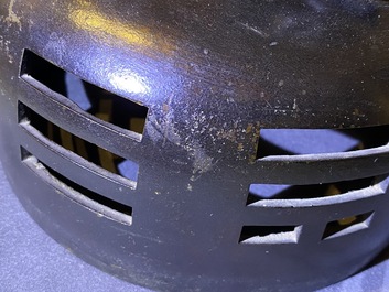 A large Chinese bronze incense burner and cover on carved wooden stand, Ming