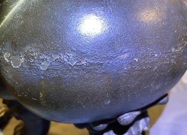 A large Chinese bronze incense burner and cover on carved wooden stand, Ming