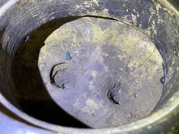 A large Chinese bronze incense burner and cover on carved wooden stand, Ming