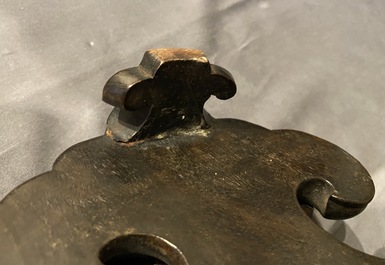 A large Chinese bronze incense burner and cover on carved wooden stand, Ming