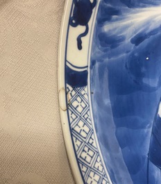 A Chinese blue and white dish with a narrative scene, Kangxi