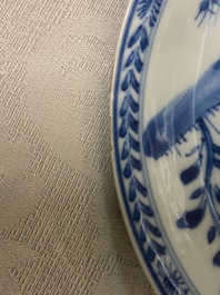 Une tasse et soucoupe en porcelaine de Chine en bleu et blanc, Kangxi