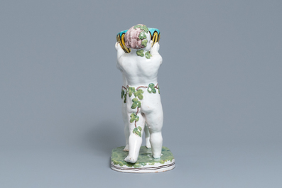 A polychrome faience group with two Bacchus figures, Geo Martel, D&egrave;svres, early 20th C.