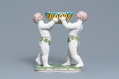 A polychrome faience group with two Bacchus figures, Geo Martel, D&egrave;svres, early 20th C.