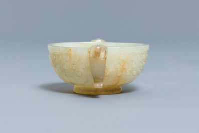 A Chinese pale celadon and russet jade two-handled bowl, prob. Ming