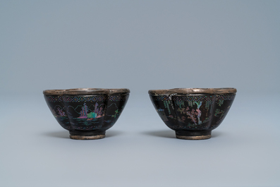 Three Chinese lac burgaut&eacute; saucers and two cups, Kangxi