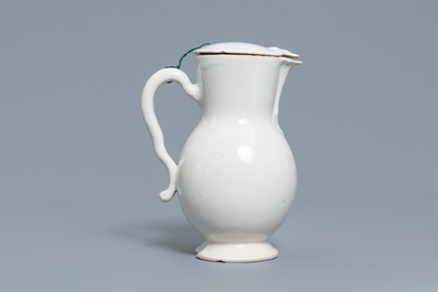 A white Delftware jug and cover, France, 18th C.