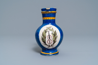 A polychrome Brussels faience commemorative 'musical design' jug, 19th C.